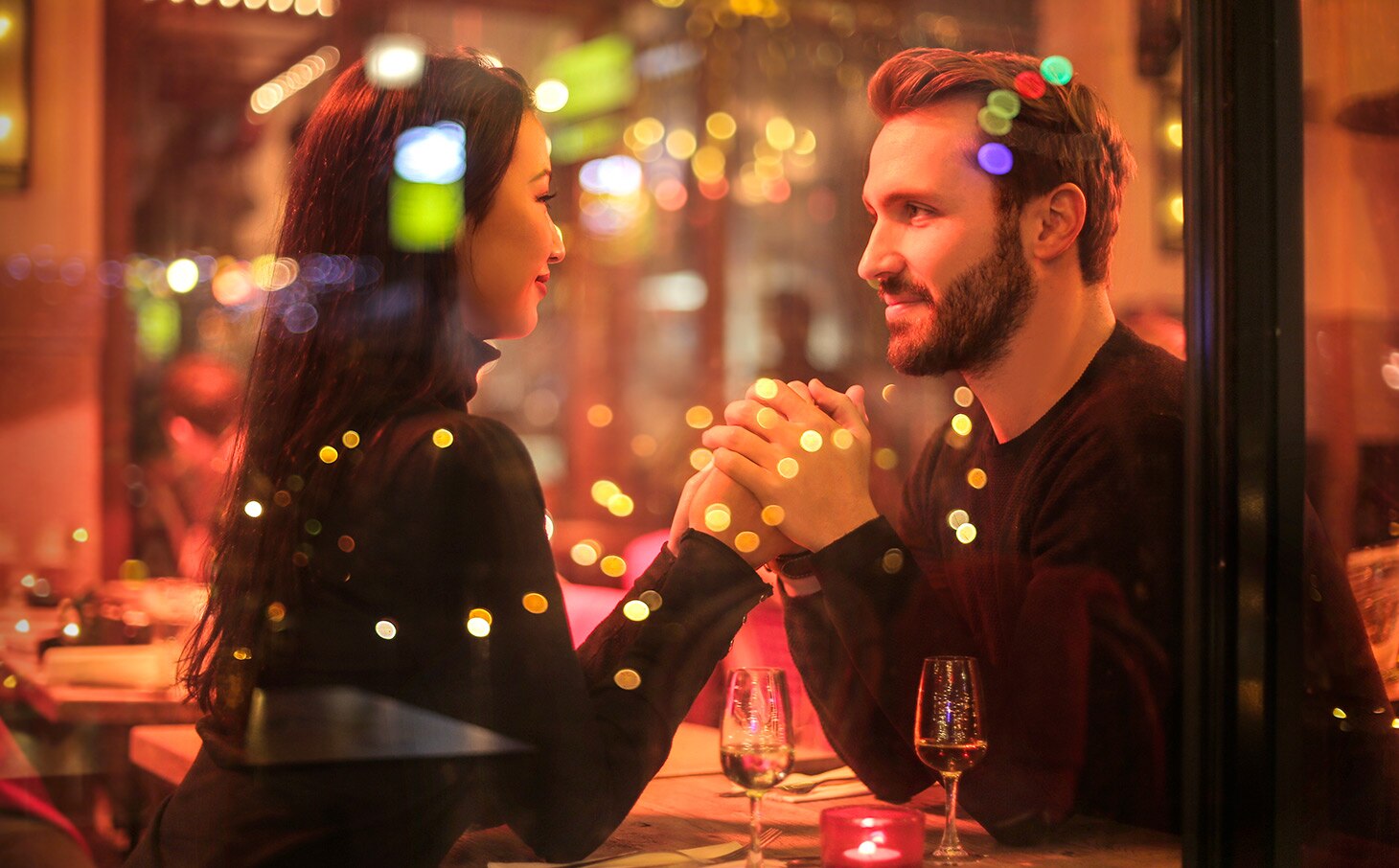 A couple of lovers celebrating their wedding anniversary at the restaurant